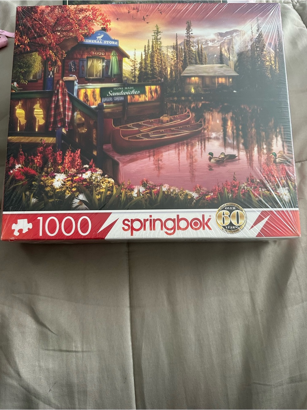 Springbok 1000-Piece Lakeside Canoes Puzzle - Red and Pink Tones
